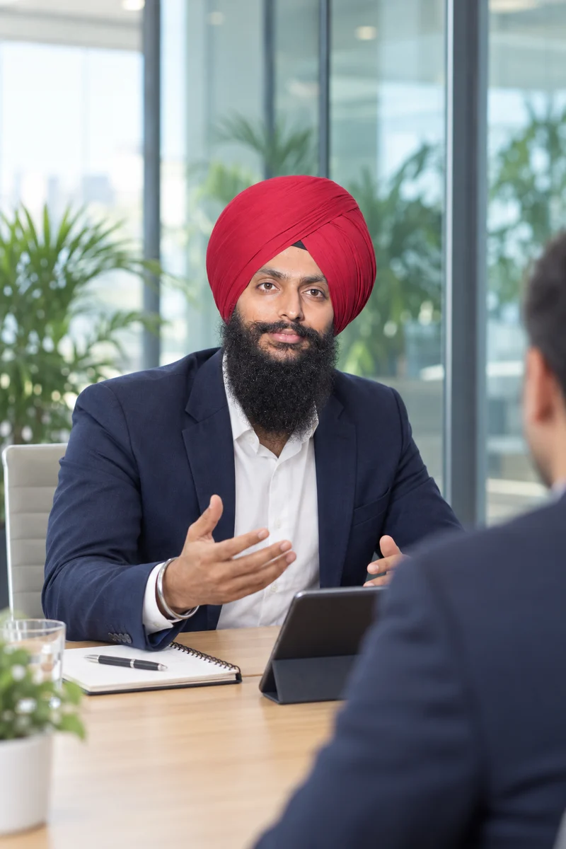 Jaspreet Singh in a meeting with a customer